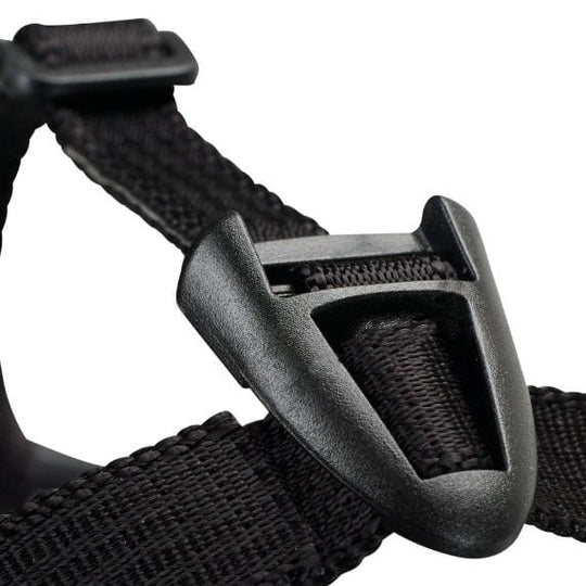 Close-up of a black belt with a buckle on a white background