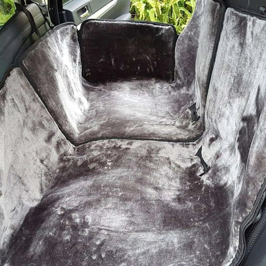 Car seat cover with a textured surface in a vehicle interior