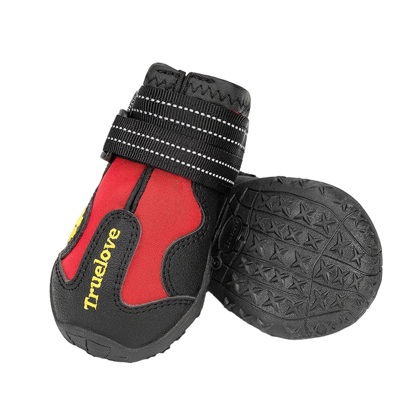Red and black dog boot with tread pattern on a white background, featuring the Truelove brand.