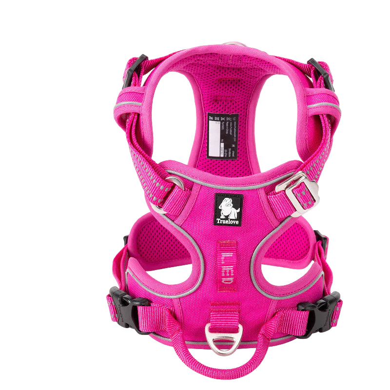 Pink dog harness with reflective stripes on a white background, featuring the Truelove brand.