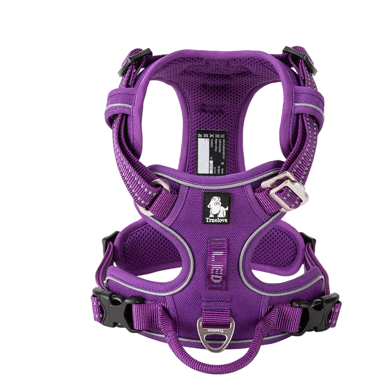 Purple dog harness with reflective straps on a white background, featuring the Truelove brand logo.